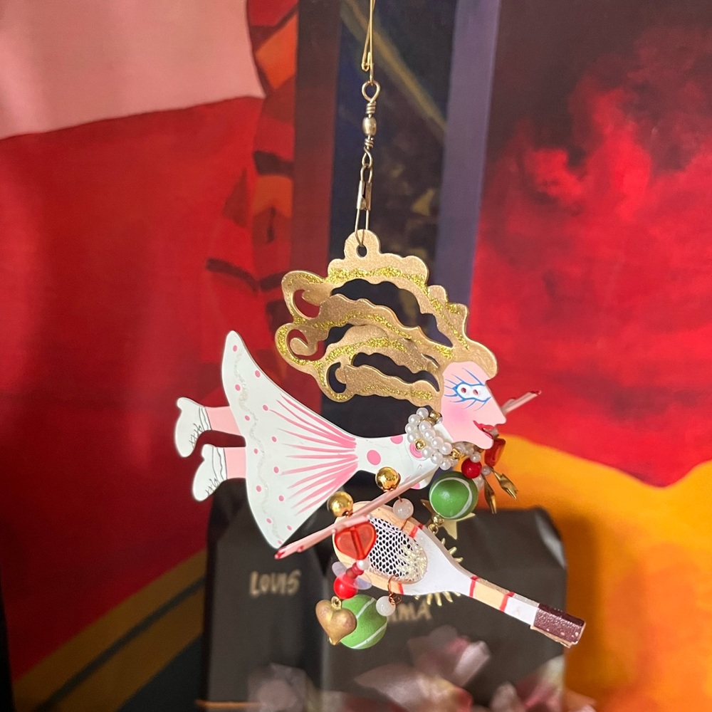 Karen Rossi tennis ornament— spins and has cute dangly things